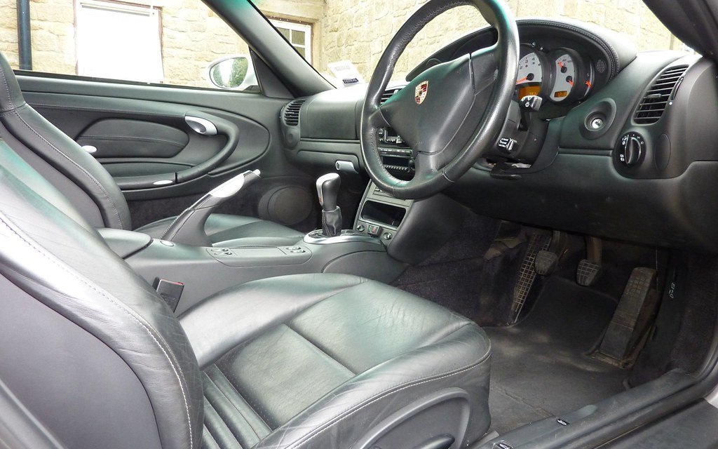 Streak-free windshield and clean cabin seen from the driver's door