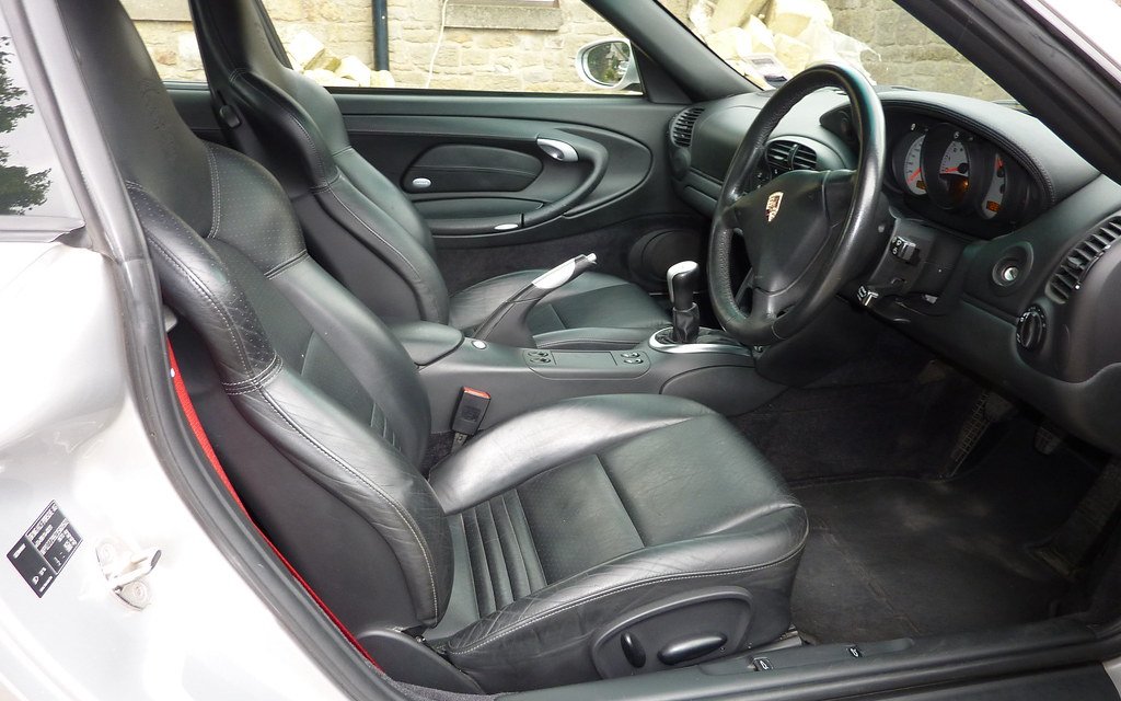 Freshly cleaned front seats seen through the open door
